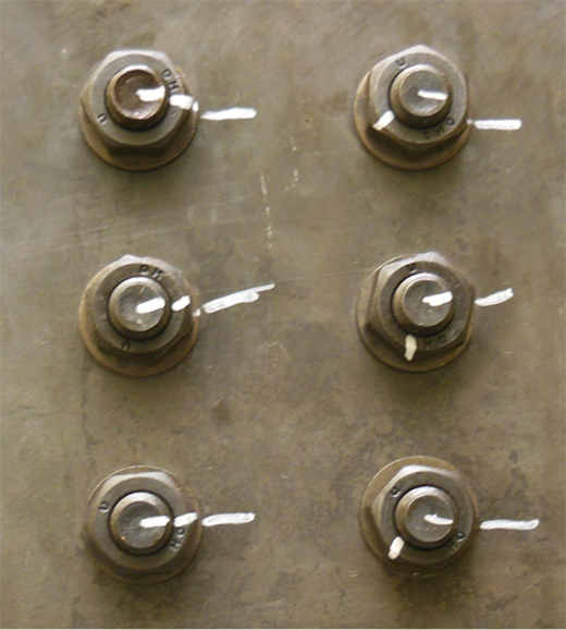 Turn-of-Nut marking clearly indicates 1/3rd turn; bolts on the left are ready for initial inspection; bolts on the right appear turned but its impossible to know
